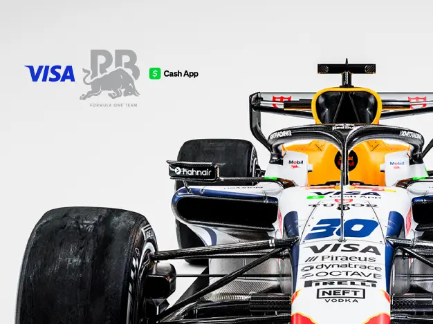 Formula 1 racing car featuring the Visa, Racing Bulls and Piraeus Bank logos